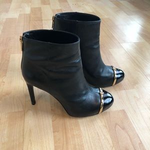 Black Tory Burch booties.